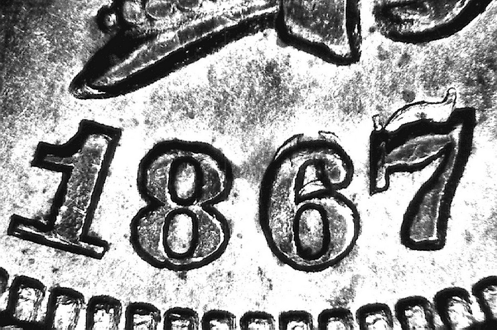 1876 Indian Head penny Repunched Date variety close-up showing doubled '18' digits south of primary date punch
